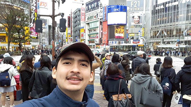Mechanical Engineering student Martin Padilla at Shibuya Crossing in Tokyo