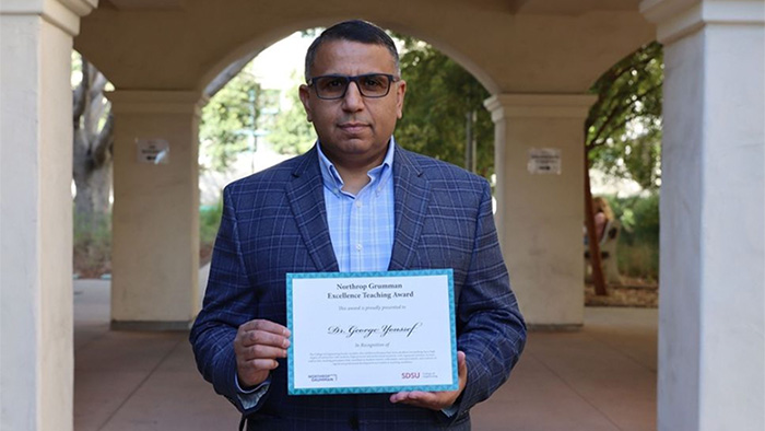 Image of Dr. Youssef with his award